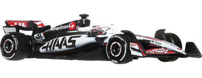 Hot Wheels 1:64 Scale Premium Race Team HAAS - Driver 1 Die-Cast Formula 1® Collectible Toy Race Car with Real Riders Tires & Metal/Metal Body & Chassis