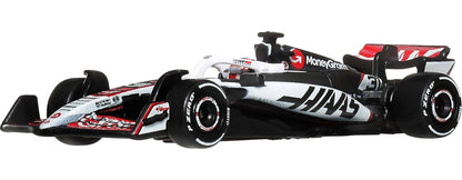 Hot Wheels 1:64 Scale Premium Race Team HAAS - Driver 1 Die-Cast Formula 1® Collectible Toy Race Car with Real Riders Tires & Metal/Metal Body & Chassis